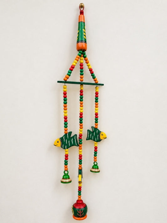Handcrafted ceramic bell hanging measuring approximately 29 inches in length, featuring ceramic bells, wooden beads, decorative artefacts, and macramé cord.