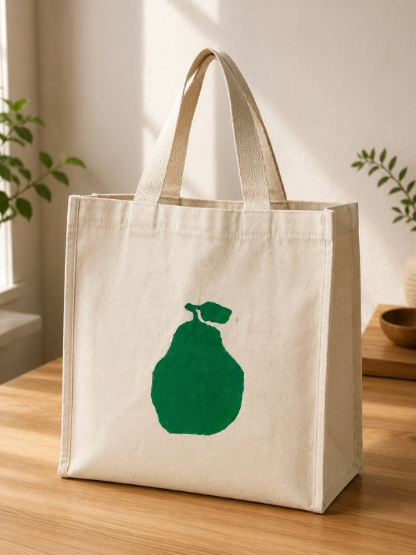  Hand-painted cotton canvas tote bag measuring approximately 14 inches wide and 13.5 inches high with a 4-inch side and bottom gusset, featuring a pear design, six inner pockets, and shoulder handles.
