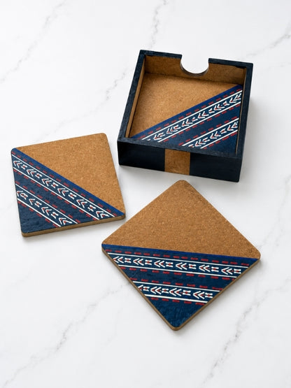 Set of four handcrafted square MDF coasters featuring hand-painted geometric artwork, designed for protecting tabletops while adding a decorative touch.