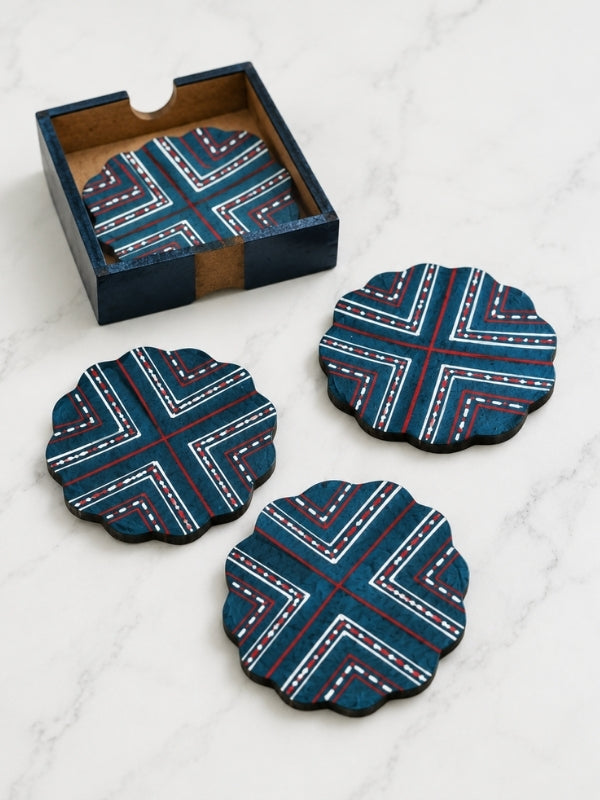 Set of four handcrafted flower-shaped MDF coasters featuring hand-painted geometric artwork with decorative cut edges, designed for protecting tabletops.