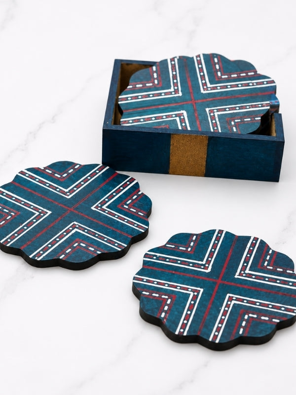 Close-up of a handcrafted flower-shaped MDF coaster highlighting the hand-painted design and decorative cut edges.