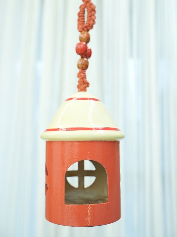 Handcrafted bird house-shaped tea light holder featuring hand-painted artwork, designed for use with an electric LED tea light as a decorative home décor piece.