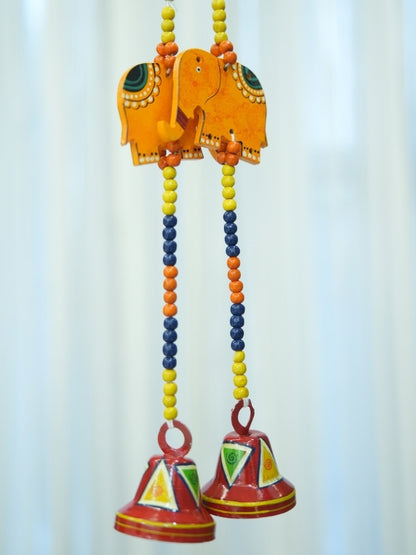 Close-up of the handcrafted elephant decorative hanging highlighting the wooden detailing, bead work, and painted finish.
