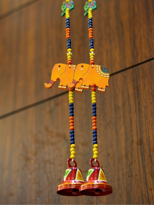 Angled view of the elephant decorative hanging showing its handcrafted structure and decorative arrangement.
