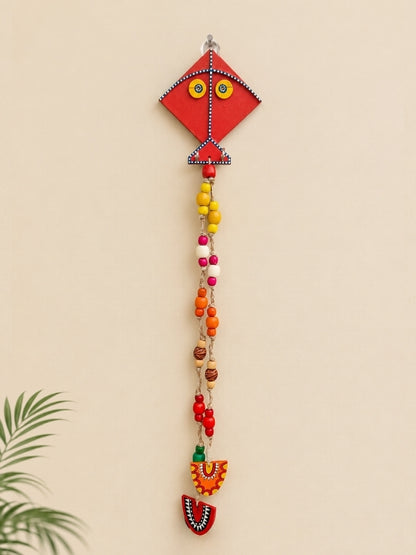 Handcrafted kite-shaped wooden key holder measuring approximately 22 inches in length, featuring wooden beads, macramé cord, and multiple hooks for organising keys.