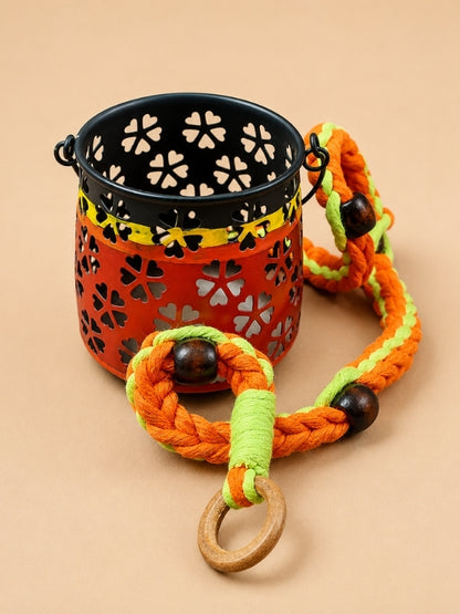Handcrafted metal tealight candle holder with a decorative lantern, fine macramé hanging cord, colourful wooden beads, measuring approximately 28 inches in length.
