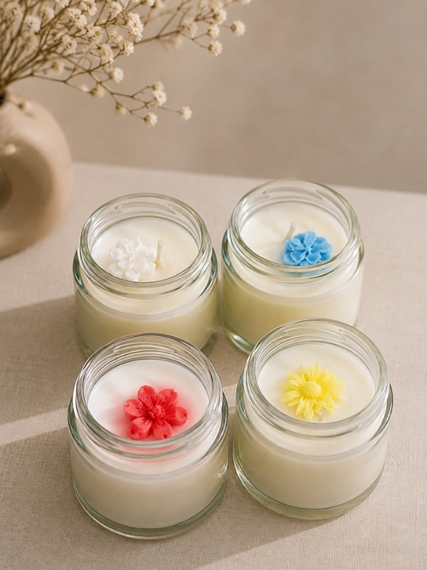 Angled view of the handcrafted set of four soy wax candles showing the individual candle shapes and handcrafted finish.
