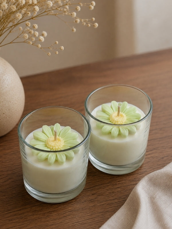 Handcrafted light green soy wax candle displayed in a living room as a decorative accent.