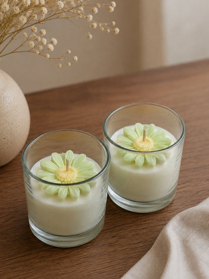 Handcrafted light green soy wax candle displayed in a living room as a decorative accent.