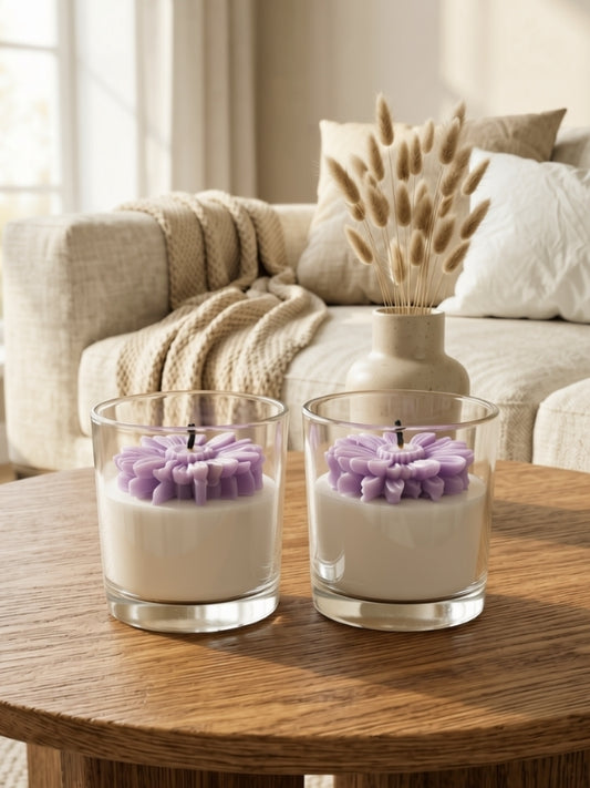 Handcrafted light purple soy wax candle decorated with naturally dried flowers, designed for home décor and gifting.
