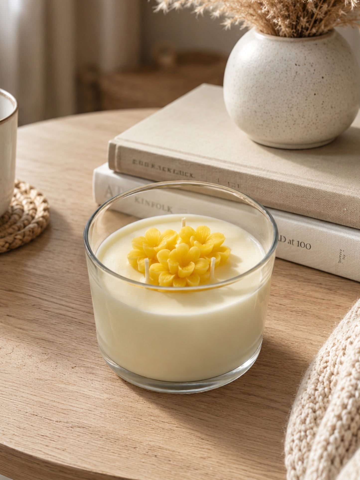 Premium orange Hand-poured scented soy wax candle placed on a tabletop, creating a warm and inviting ambience for home décor or gifting.
